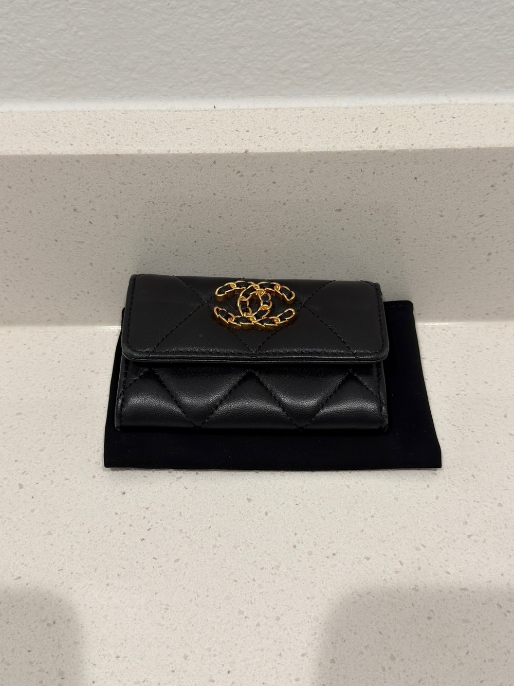 Black Quilted Leather Mini Wallet with Gold Logo